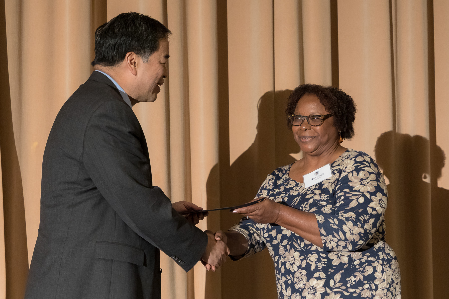 Nell Cobb, right, with A. Gabriel Esteban, Ph.D., president, as faculty and staff members are inducted into DePaul University's 25 Year Club, Tuesday, Nov. 13, 2018, at the Lincoln Park Student Center. Employees celebrating their 25th work anniversary were honored at the luncheon with their colleagues and will have their names added to plaques located on the Loop and Lincoln Park Campuses. (DePaul University/Jeff Carrion)
